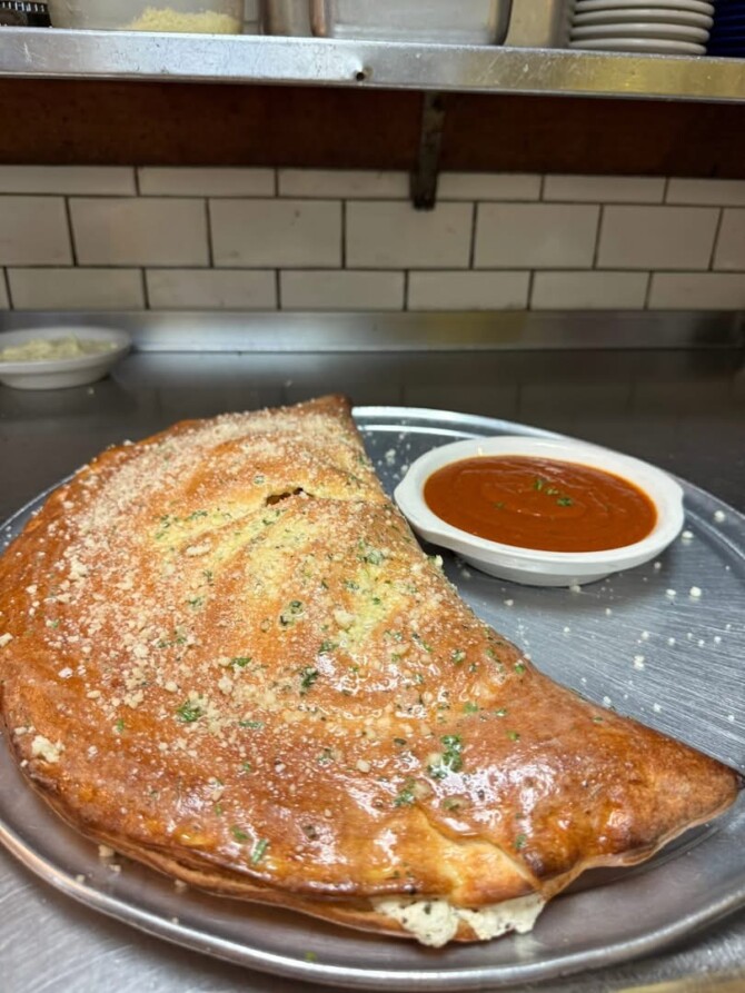NYPD Pizza Winter Garden's "Big Zoni" Calzone Challenge